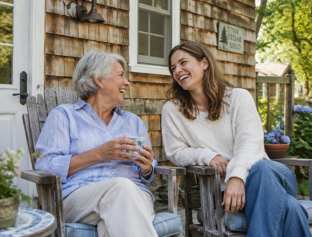 Mother and daughter on the porch of a backyard cottage